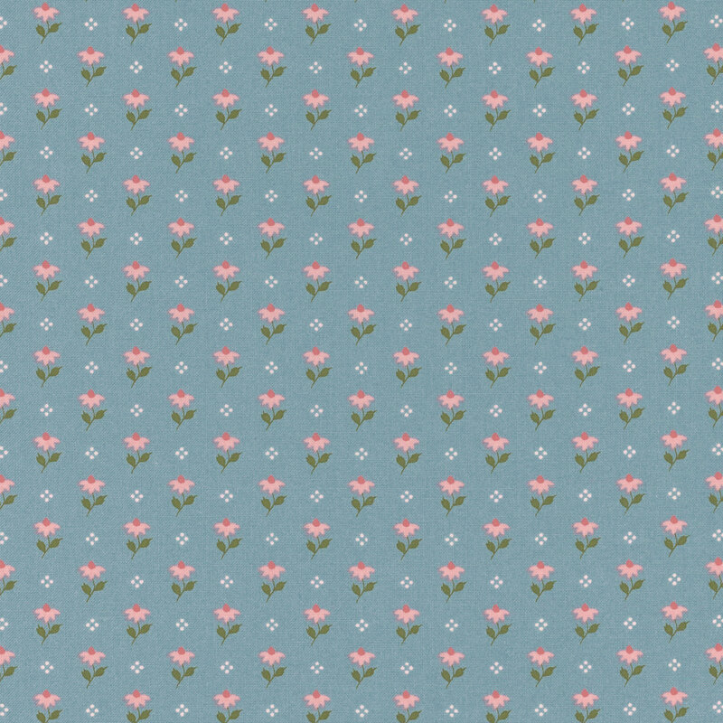 Blue fabric featuring a pattern of pink flowers and white dots.