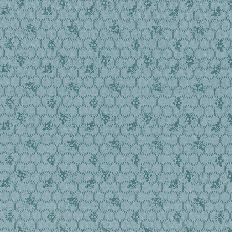 Tonal blue fabric featuring a Honeycomb pattern with bees