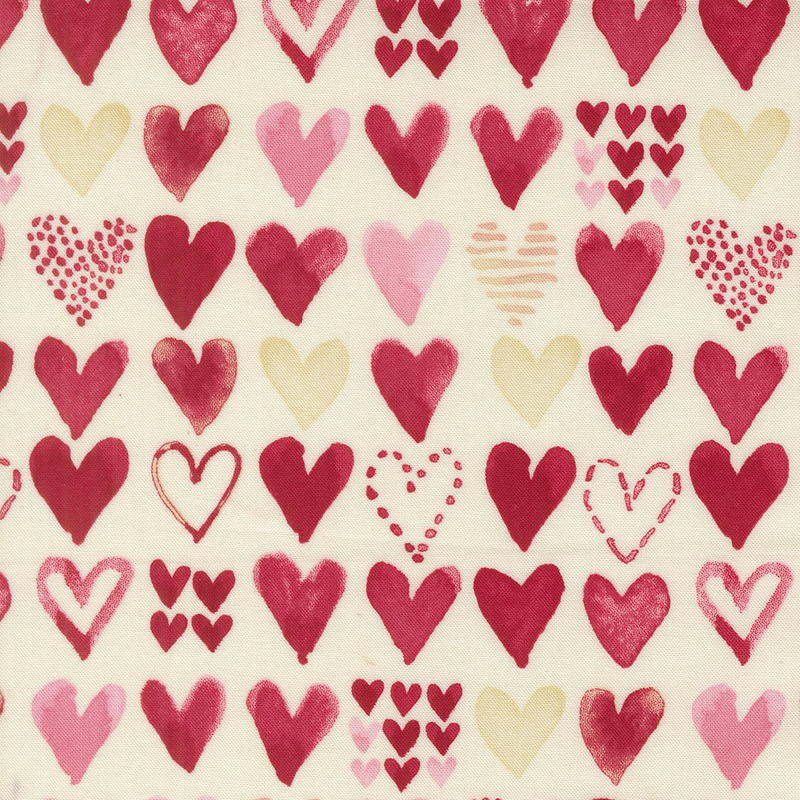 Light cream fabric with rows of pink, cream, and red watercolor hearts in varying designs.