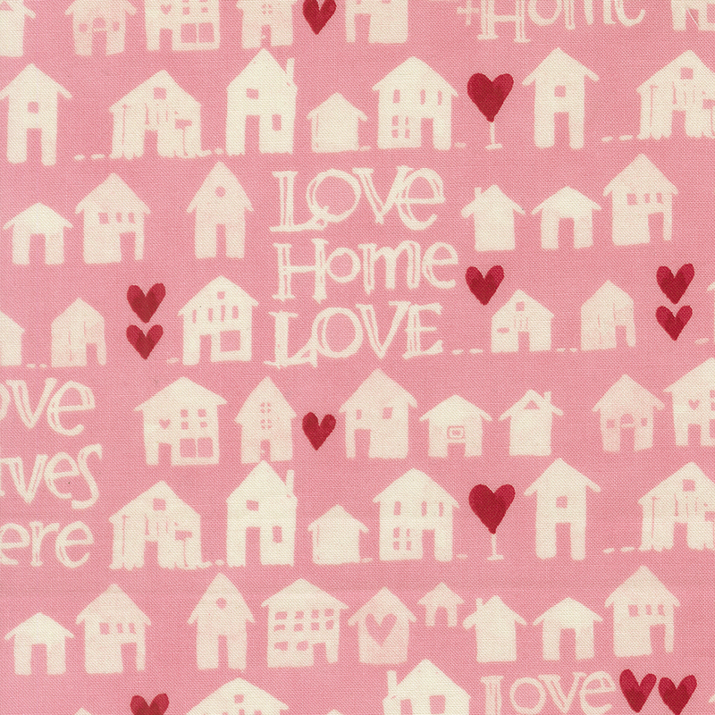 Candy pink fabric with rows of cream watercolor houses, red hearts, and phrases like 