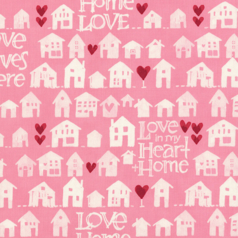 Candy pink fabric with rows of cream watercolor houses, red hearts, and phrases like 