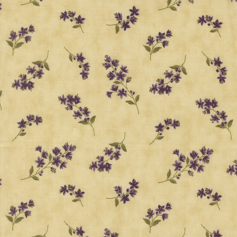Light tan mottled fabric with tossed sprigs of violets.