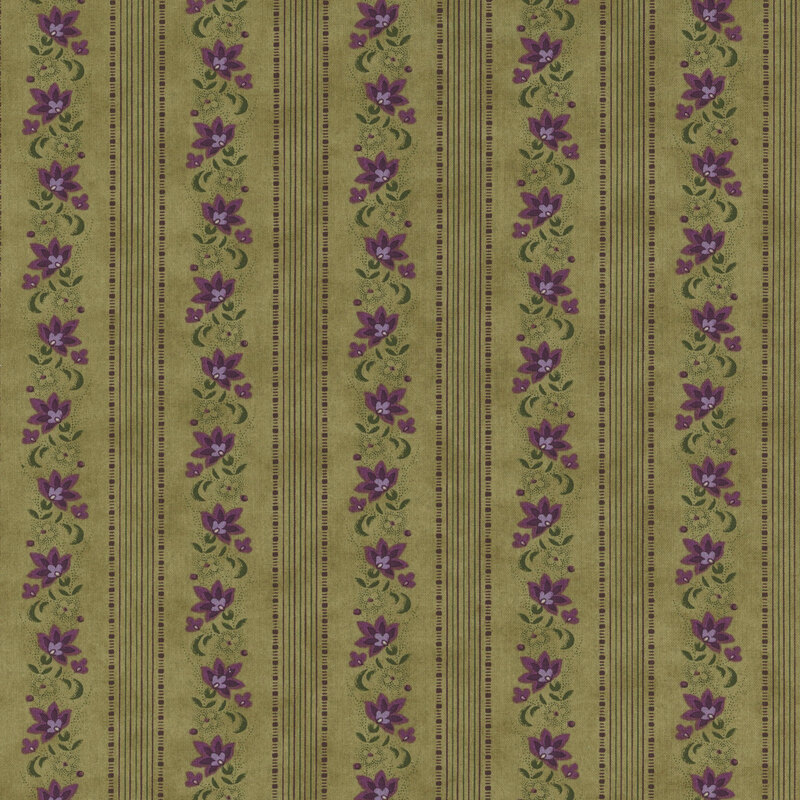 Fern green fabric with lines of thin purple and green stripes and violet flowers.