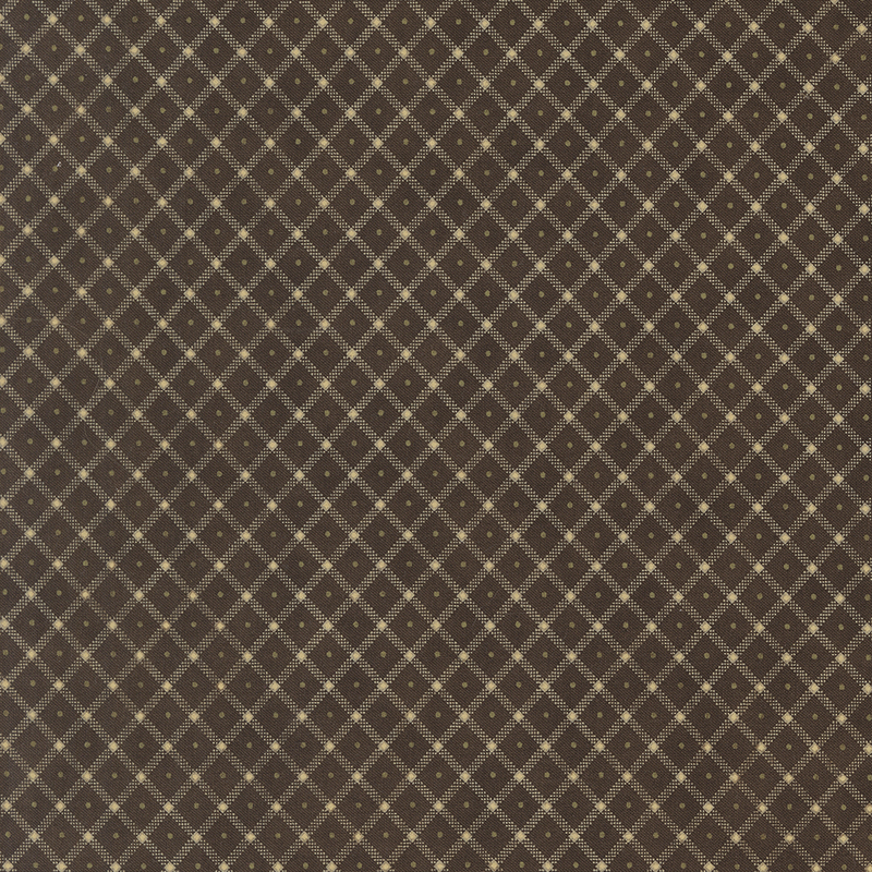Brown fabric with a cream lattice design and green pinprick dots in the center of each.
