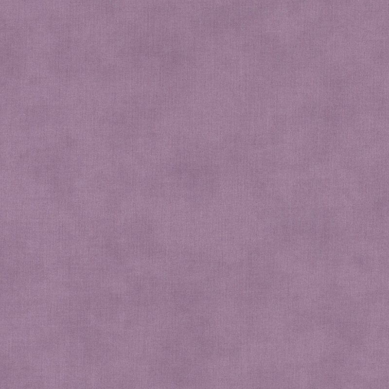 Solid mottled light purple fabric.