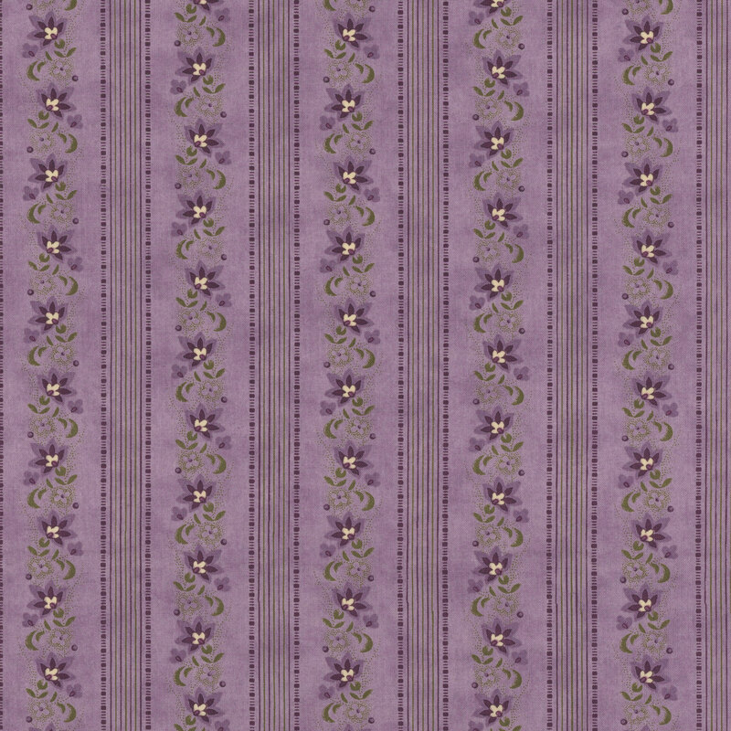 Light purple fabric with lines of thin purple and green stripes and violet flowers.