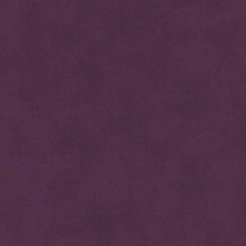 Solid mottled plum purple fabric.
