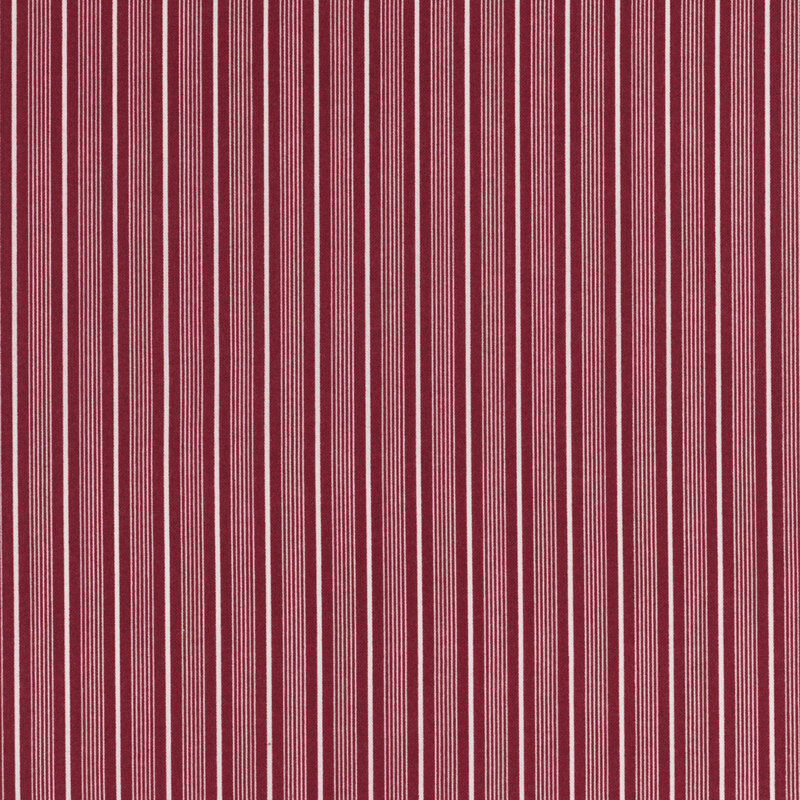 Red fabric with thin white vertical stripes, creating a textured pattern.