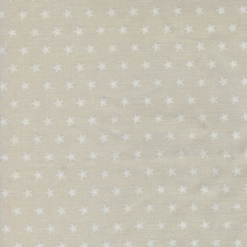Light beige fabric with a repeating pattern of small white stars.