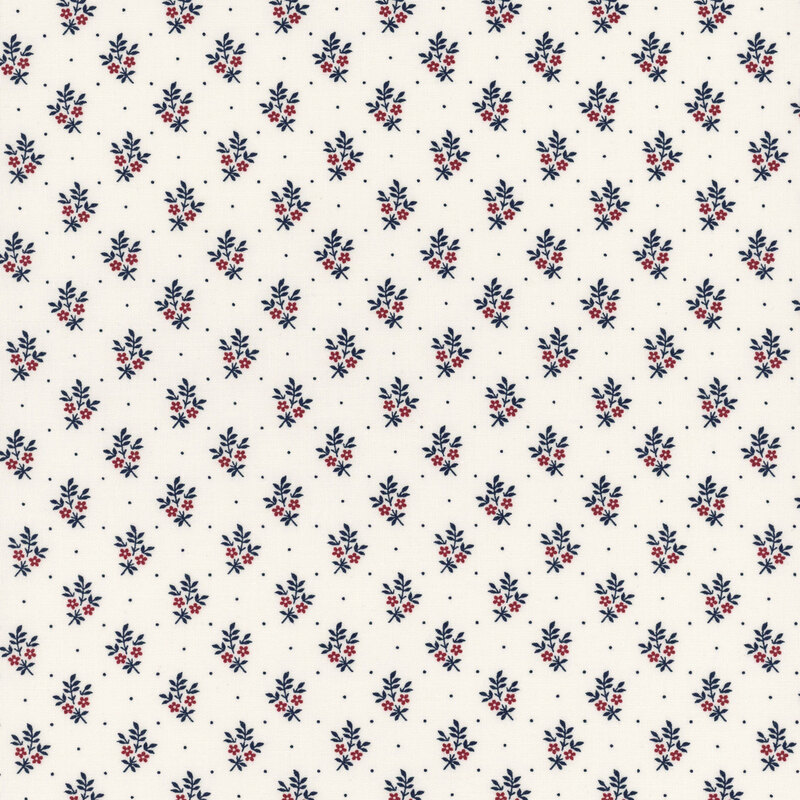 A fabric pattern featuring small blue and red floral designs on a cream background.