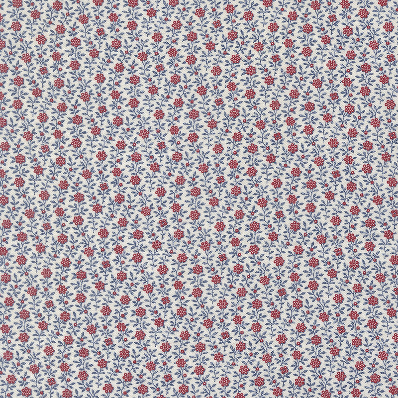 A repeating pattern of small red and blue flowers on a light background.