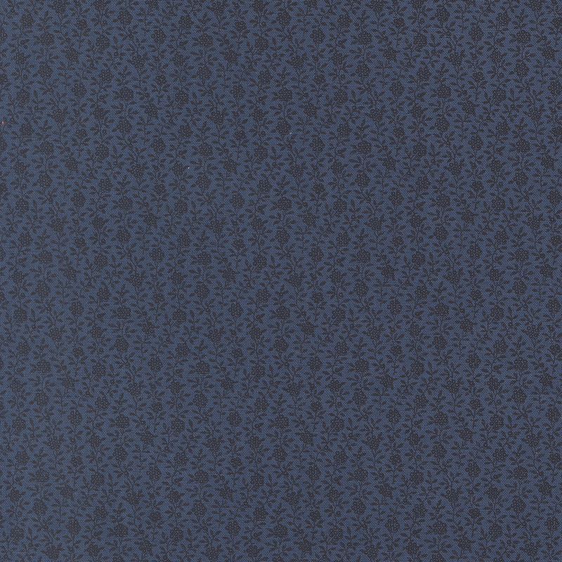 Dark blue fabric with a subtle pattern of small, intricate floral designs.