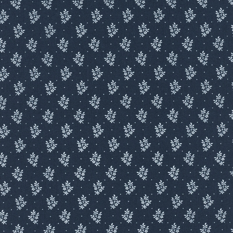 Dark blue fabric with a delicate, repeating white floral pattern throughout.
