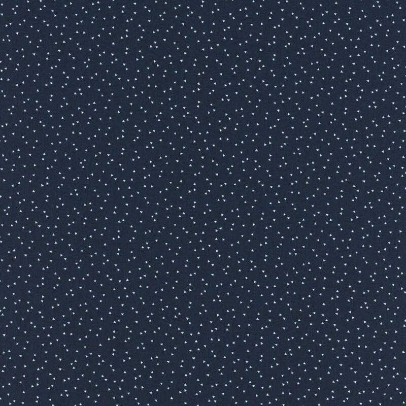 Dark navy fabric with a scattered pattern of small white triangles.