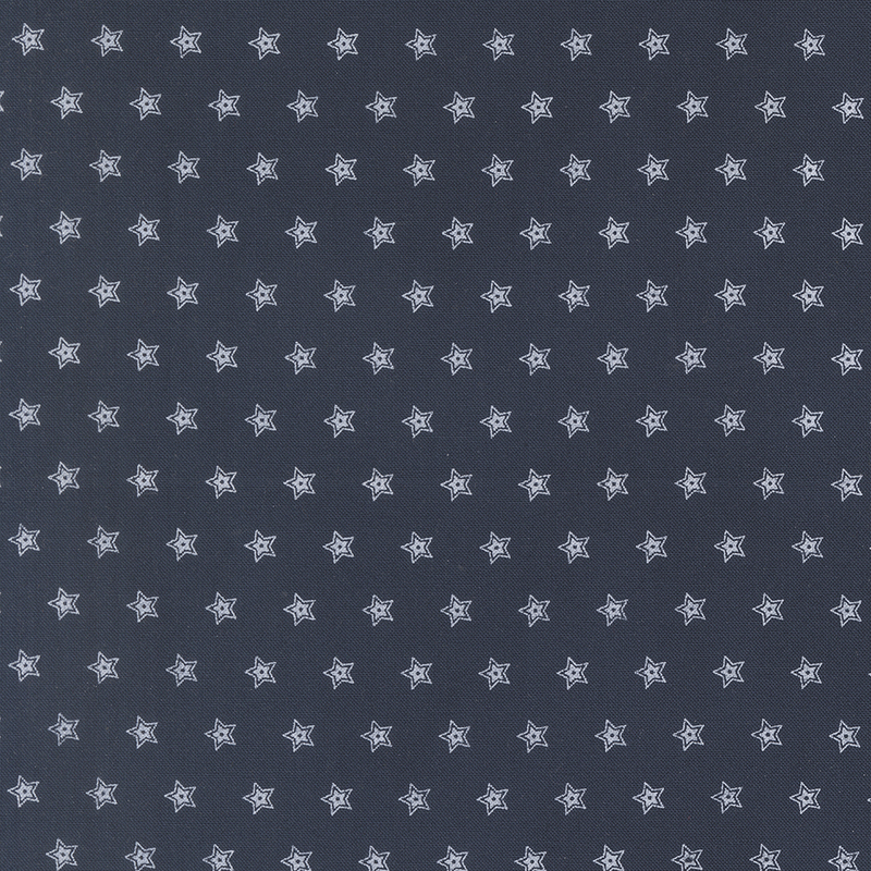 A dark blue fabric pattern featuring white star shapes arranged in a uniform grid.