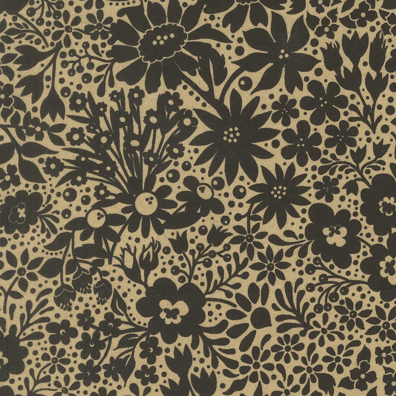 Tan fabric with a dense pattern of stylized floral silhouettes in black.