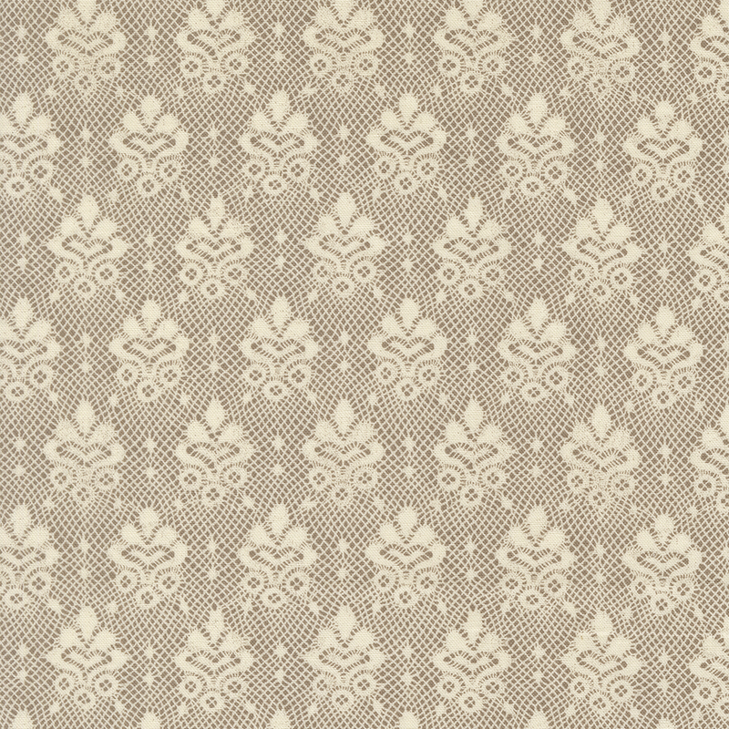 A light cream lace pattern on a light greige background.