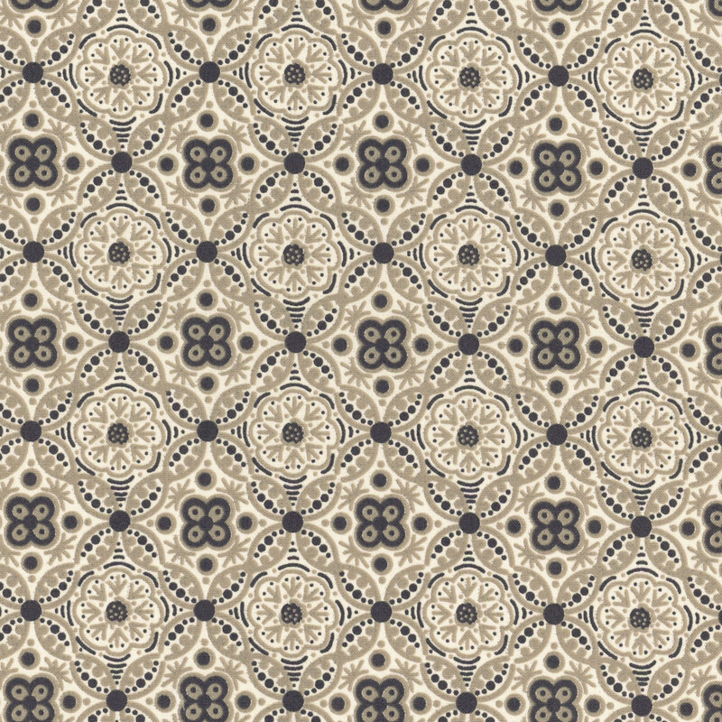 An intricate tiled and ornamental pattern in tonal cream, gray, and black.