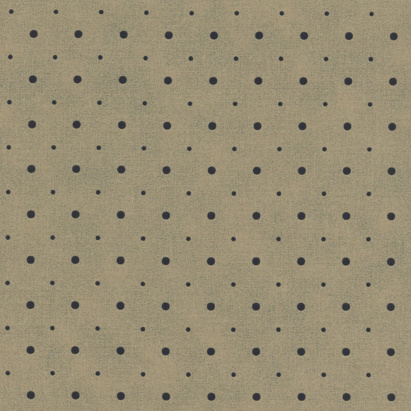 A black fabric with small and medium sized tan and tonal gray polka dots.