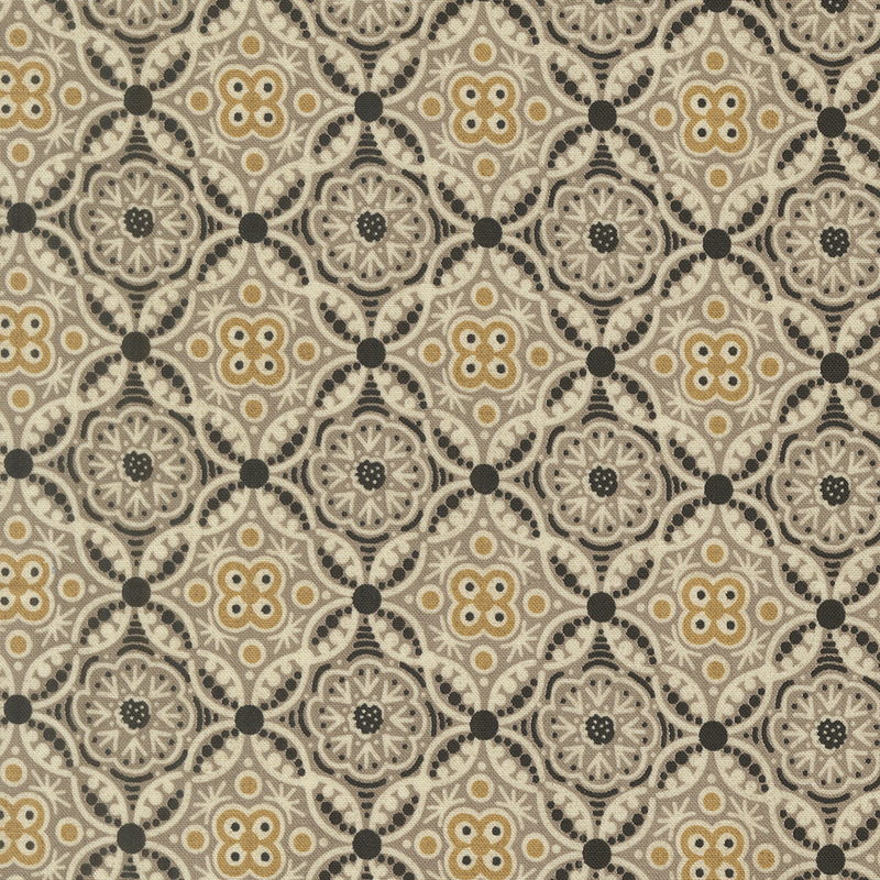 An intricate tiled and ornamental pattern in black, cream, greige, and ocher.