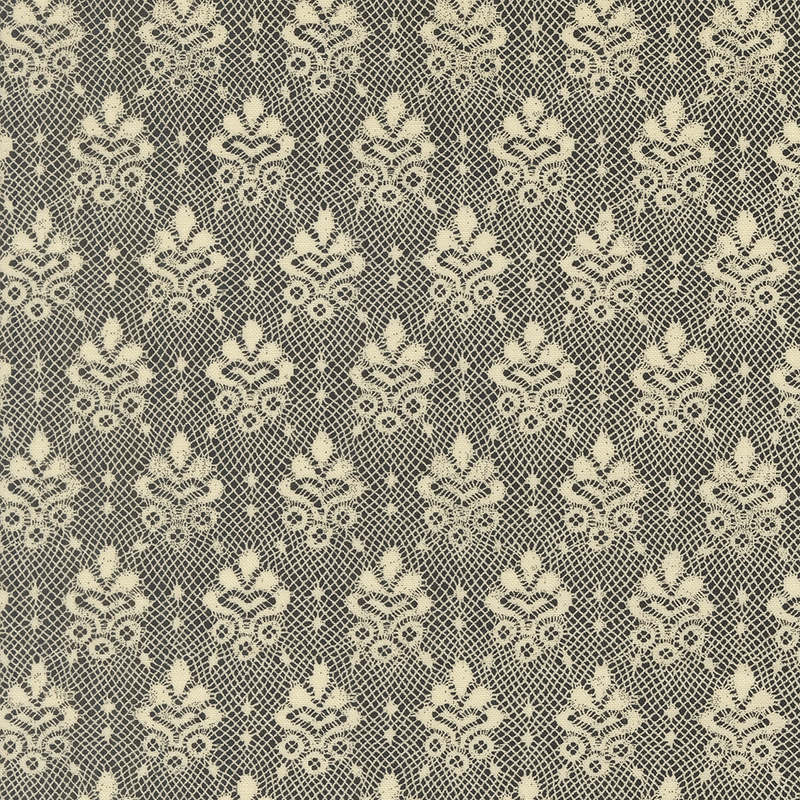 A light cream lace pattern on a black background.