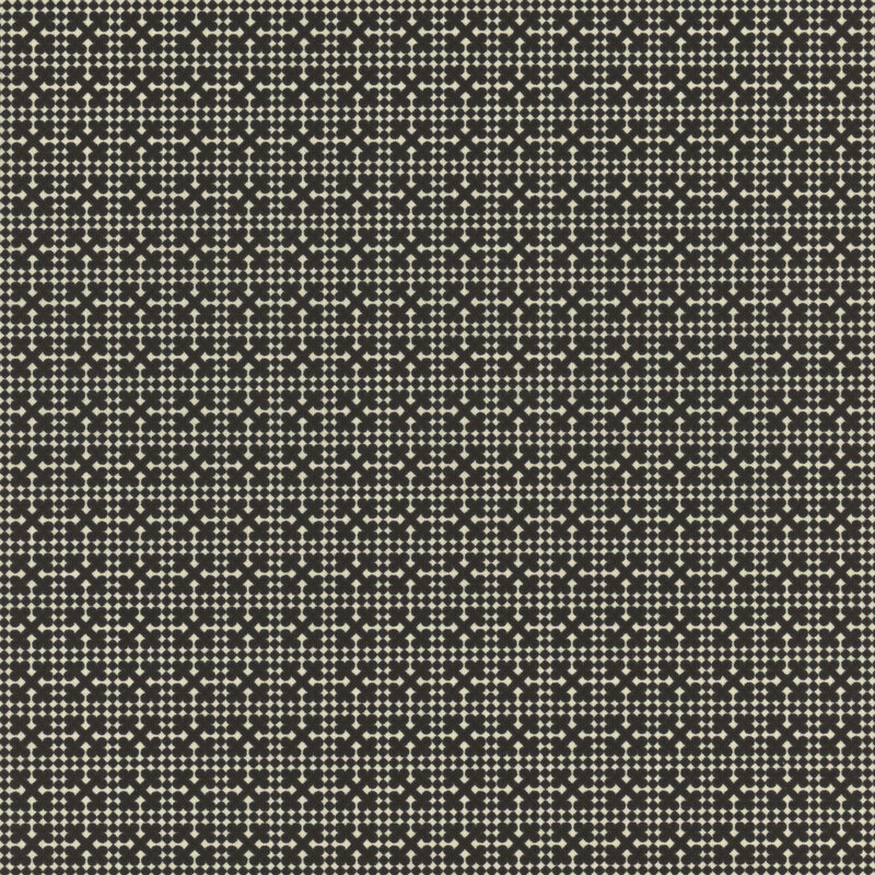 A black fabric with a cream geometric netting design.