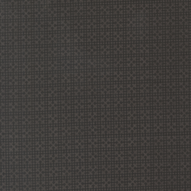 A black fabric with a tonal dark gray geometric netting design.