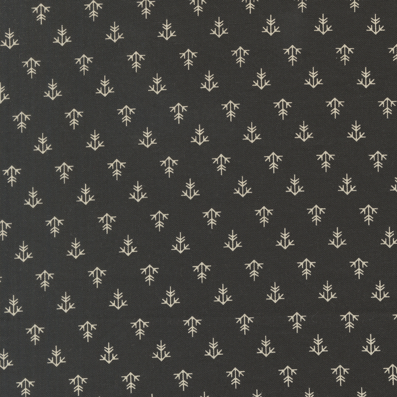 A black fabric with a uniform pattern of cream line shapes.