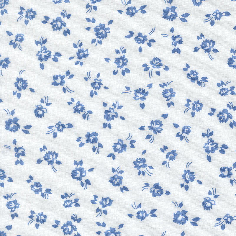 White fabric with small blue tossed florals.