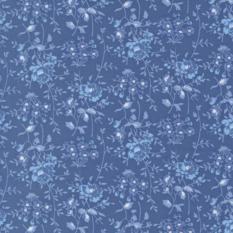 Light blue fabric with tonal florals and sprawling stems.