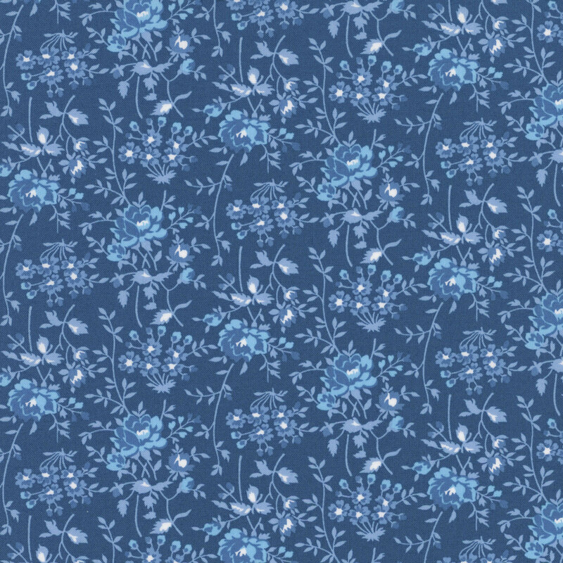Light blue fabric with tonal florals and sprawling stems.
