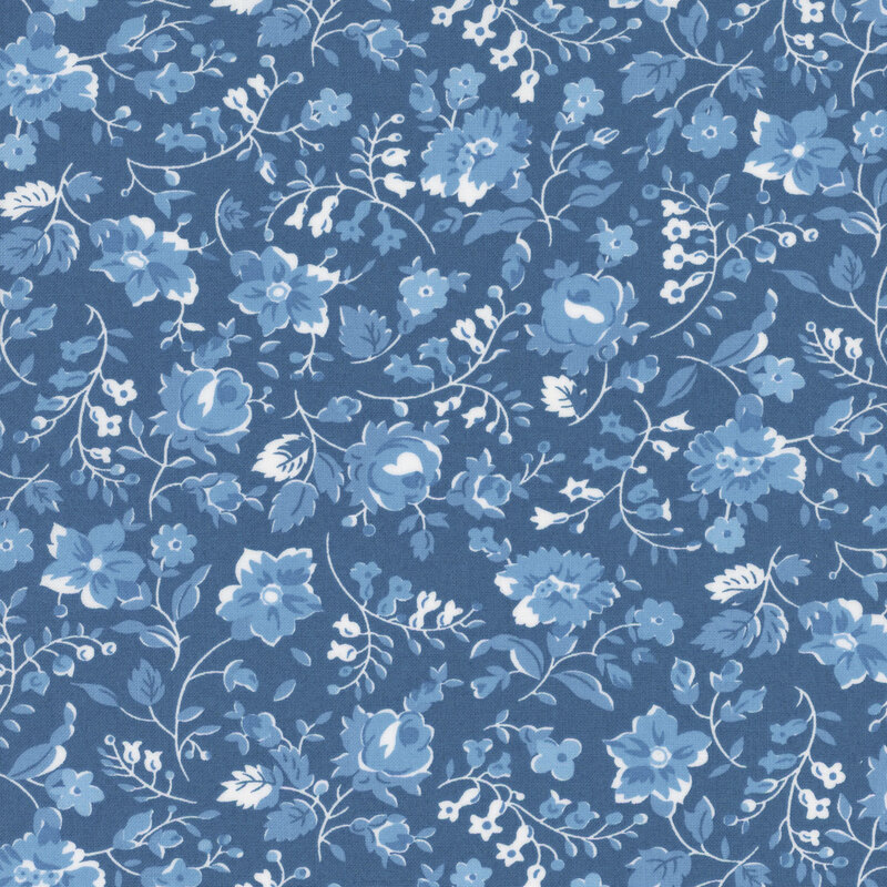 Light blue fabric with blue and white florals, sprawling leaves, and stems.
