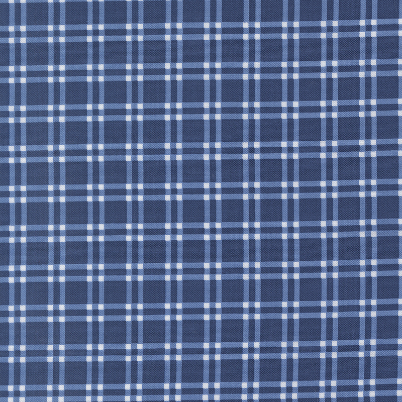 Navy fabric with a white and lighter blue plaid pattern.
