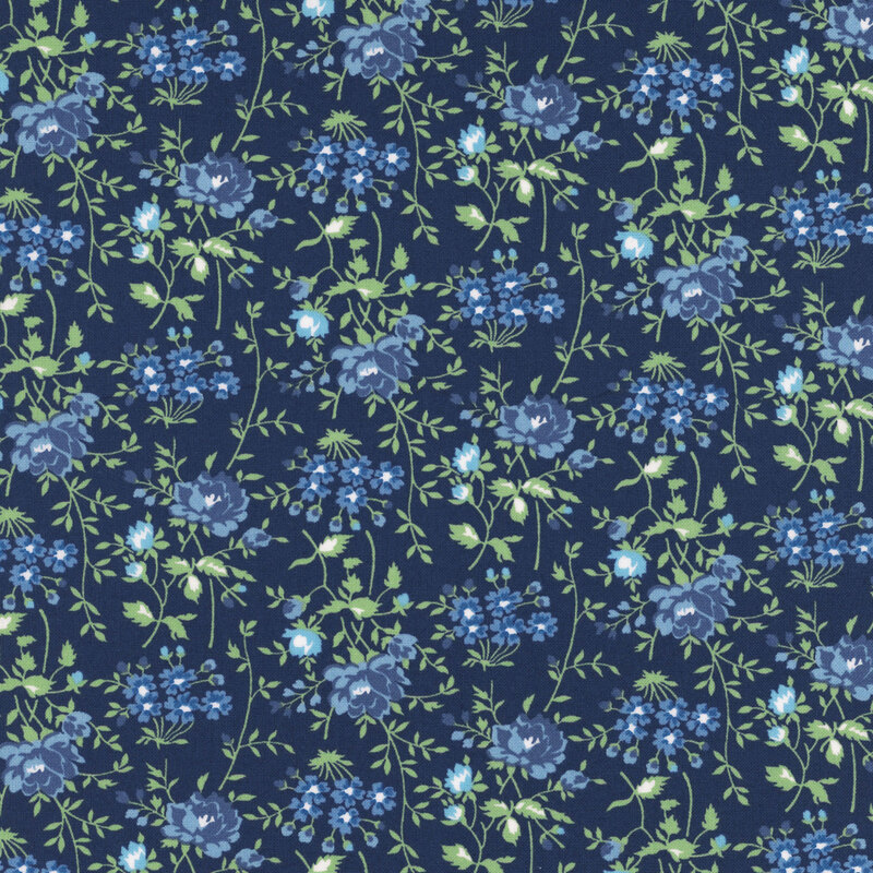 Navy fabric with light blue florals with sprawling green stems.