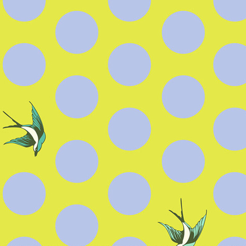 A bright chartreuse fabric with large periwinkle blue dots and tossed starlings.