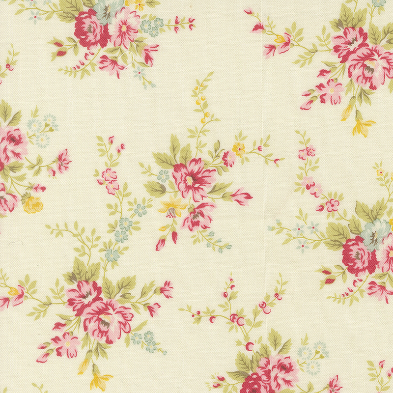 Cream fabric with tossed vintage pink rose bouquets with green leaves and yellow and blue floral accents.