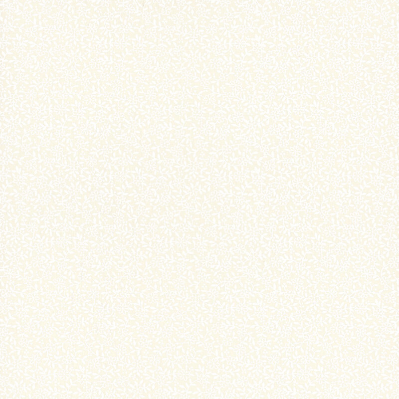 Cream fabric with a white pearlized dense floral and leaf design.