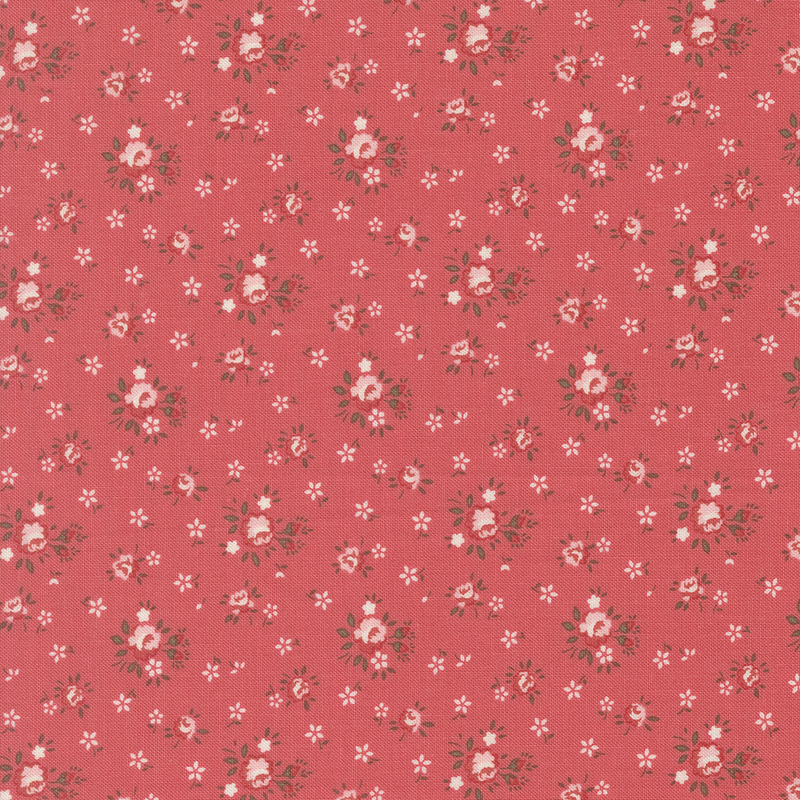 Bright coral red fabric with tossed white mini flowers and small tonal pink roses.
