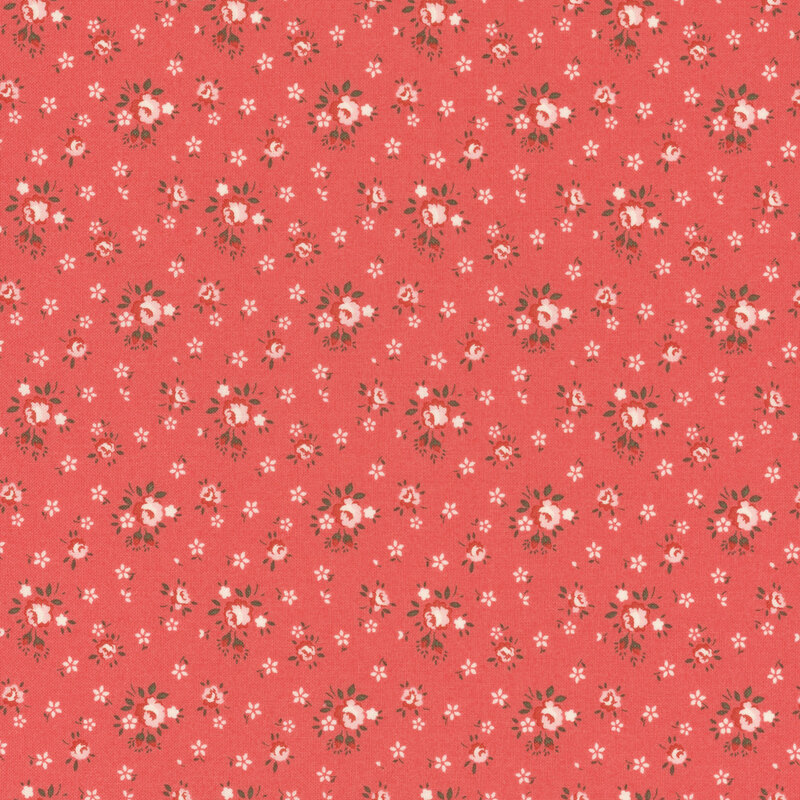 Bright coral red fabric with tossed white mini flowers and small tonal pink roses.