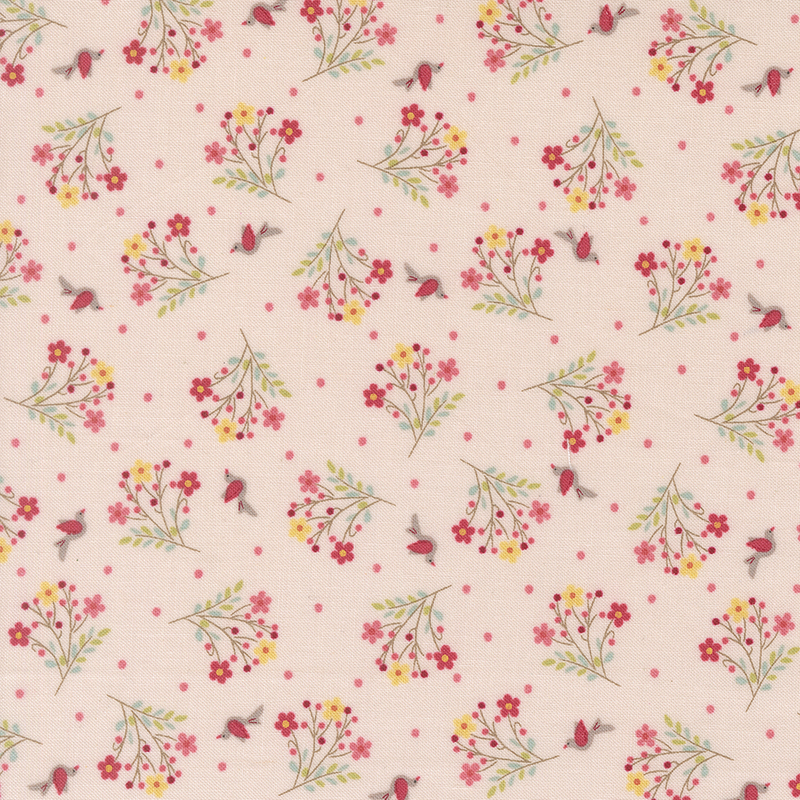 Baby pink fabric with tonal polka dots, red birds, and tossed floral bouquets.