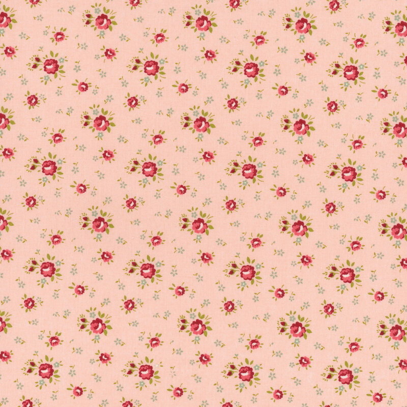 Light pink fabric with tossed blue mini flowers and small pink roses.