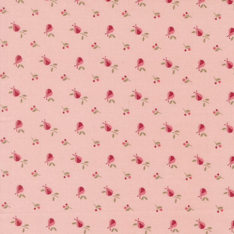 Pink fabric with a ditsy ladybug and sprig pattern in tonal pink, red, and brown.