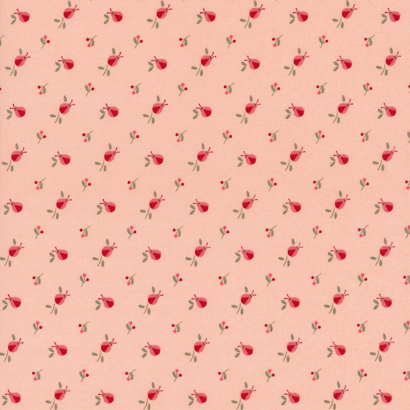 Pink fabric with a ditsy ladybug and sprig pattern in tonal pink, red, and brown.