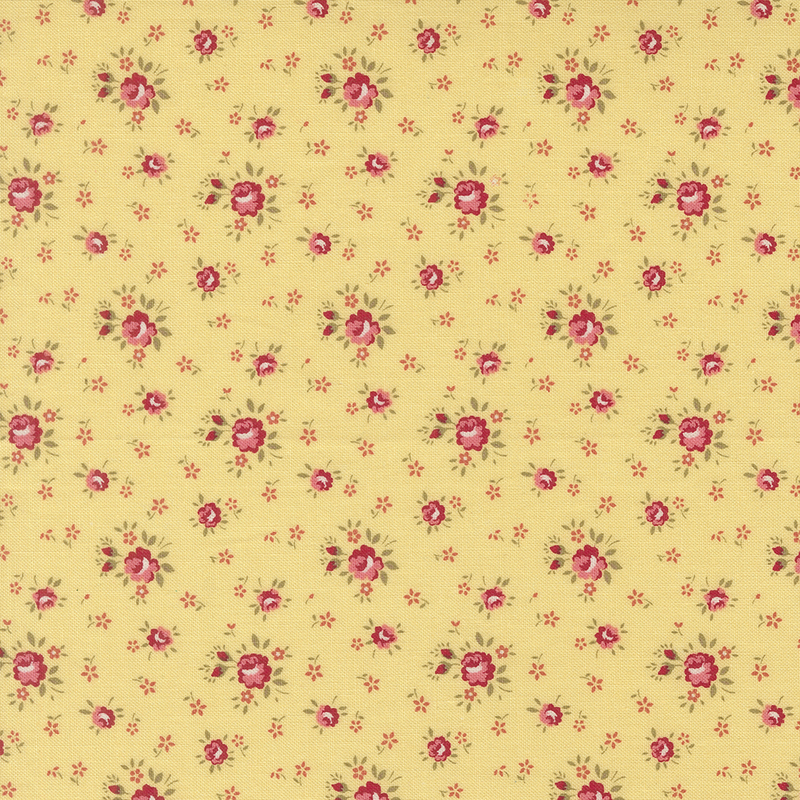 Yellow fabric with tossed pink mini flowers and small pink roses.