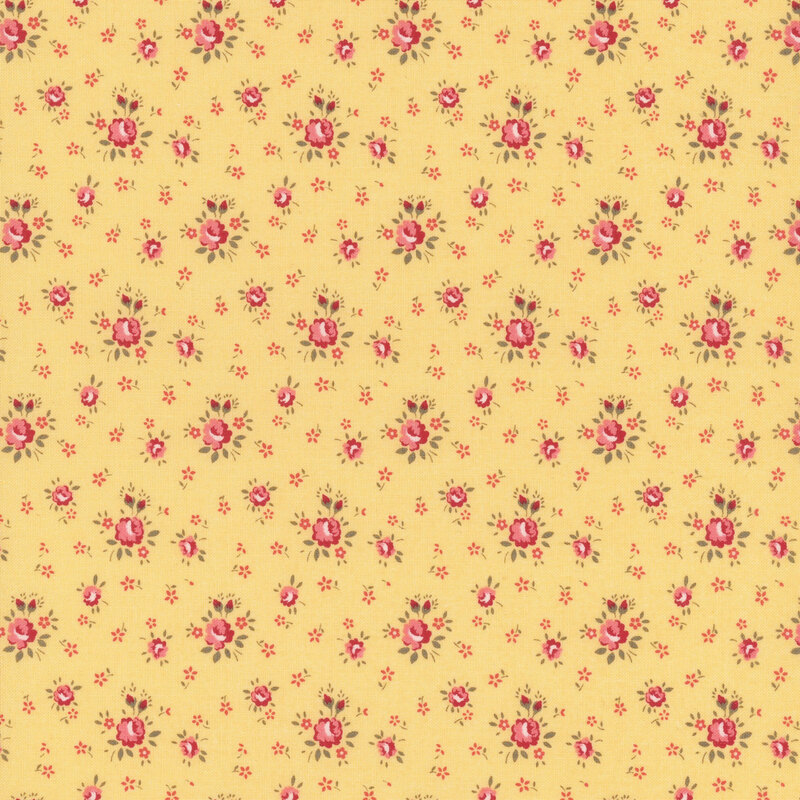 Yellow fabric with tossed pink mini flowers and small pink roses.