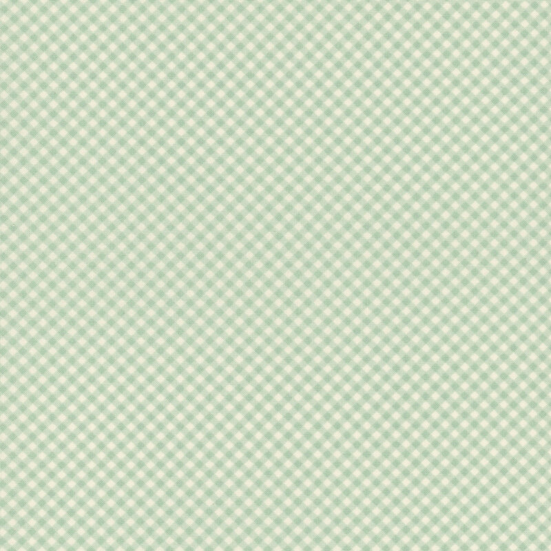 Green and cream gingham fabric swatch.