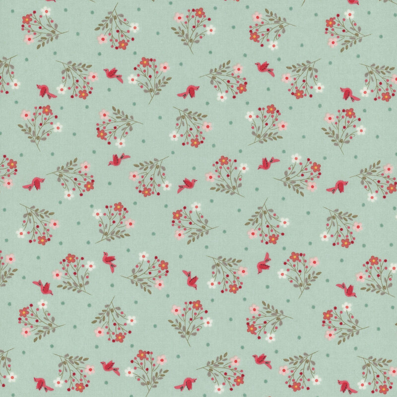 Teal blue fabric with tonal polka dots, red birds, and tossed floral bouquets.