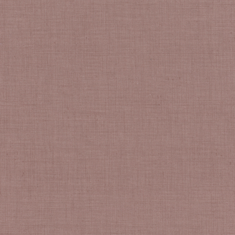 Muted mauve fabric with a woven texture.
