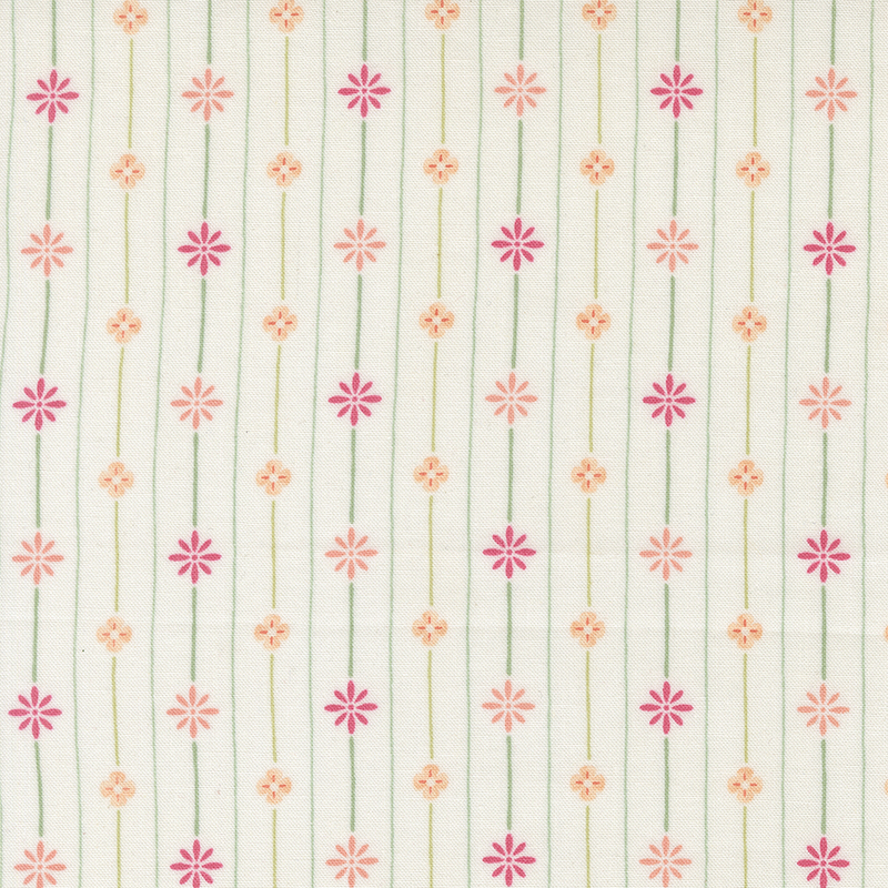 An off white fabric with stripes with pink and peach floral elements.