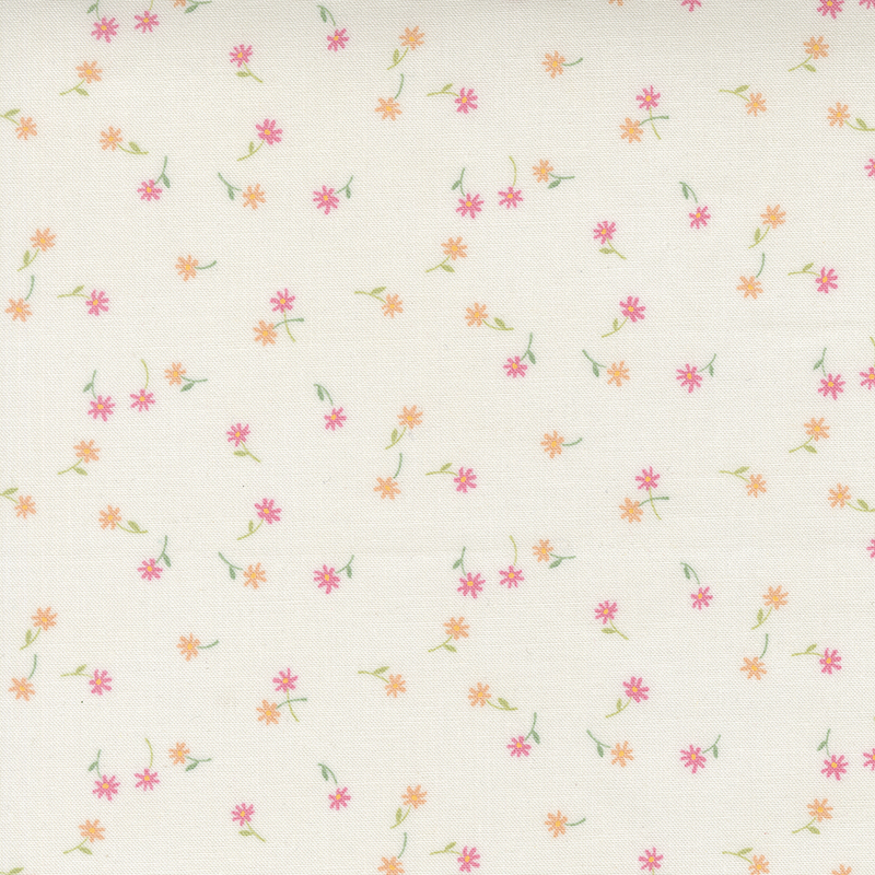 A cream fabric with tossed small pink and coral flowers and stems.
